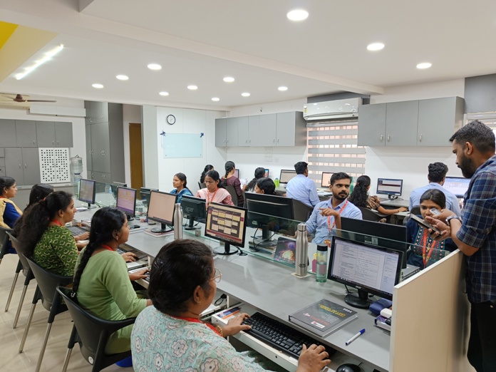 The NORMS Management compliance team at work in the Ernakulam office